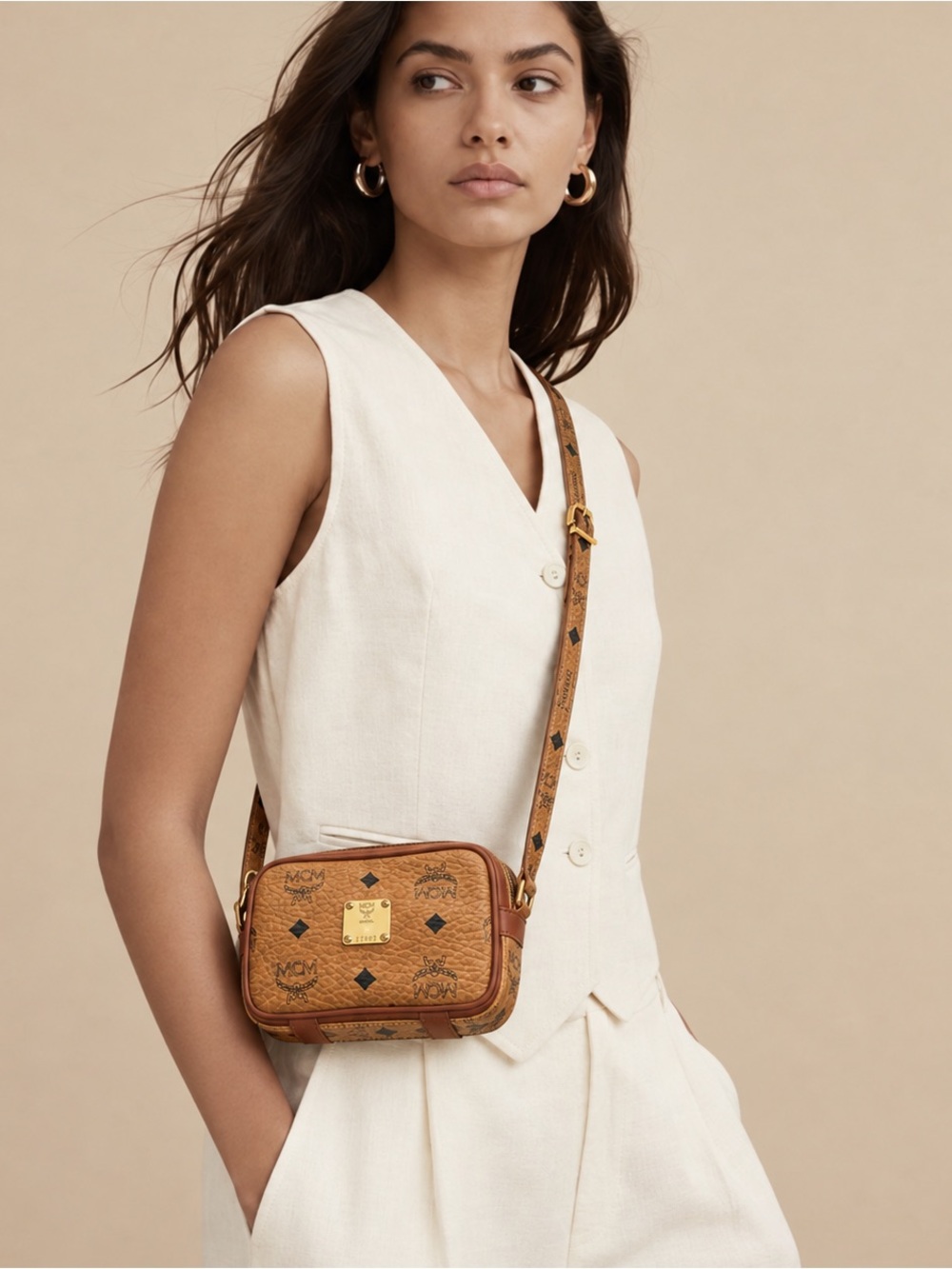 MCM Visetos Small Cognac Crossbody Bag with Hold Hardware with adjustable Strap.